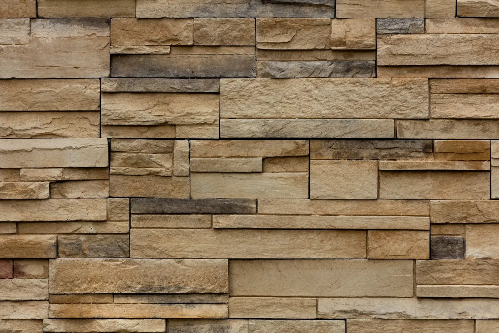 Warm brown brick facade with tight joints by MCG Top Masonry